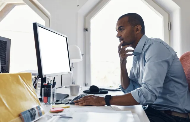 Man exploring insights hub on his computer