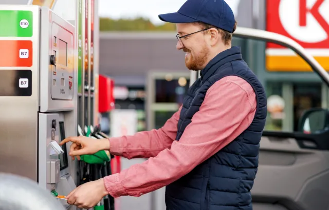 Man paying for his fuel at a Circle K station