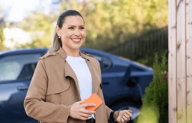 Picture of woman with a charger and b2b card