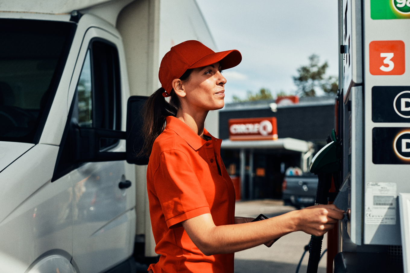 woman fueling her van at Circle K